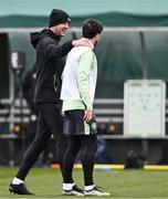 19 March 2024; Interim head coach John O'Shea and Mikey Johnston during a Republic of Ireland training session at the FAI National Training Centre in Abbotstown, Dublin. Photo by Stephen McCarthy/Sportsfile