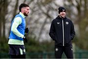 19 March 2024; Interim head coach John O'Shea and Matt Doherty, left, during a Republic of Ireland training session at the FAI National Training Centre in Abbotstown, Dublin. Photo by Stephen McCarthy/Sportsfile