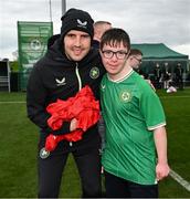 19 March 2024; Republic of Ireland interim head coach John O'Shea with Fergus Cosgrove, from Navan, Meath, of the Ireland Down Syndrome Futsal squad on a visit to a Republic of Ireland training session at the FAI National Training Centre in Abbotstown, Dublin. Photo by Stephen McCarthy/Sportsfile