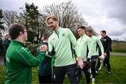 19 March 2024; Republic of Ireland's Caoimhin Kelleher meets David Crawford, from Donegal Town, of the Ireland Down Syndrome Futsal squad on a visit to a Republic of Ireland training session at the FAI National Training Centre in Abbotstown, Dublin. Photo by Stephen McCarthy/Sportsfile