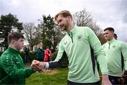19 March 2024; Republic of Ireland's Caoimhin Kelleher meets Cian Kelleher, from Mallow, Cork, of the Ireland Down Syndrome Futsal squad on a visit to a Republic of Ireland training session at the FAI National Training Centre in Abbotstown, Dublin. Photo by Stephen McCarthy/Sportsfile