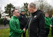 19 March 2024; Republic of Ireland technical advisor Brian Kerr meets Josh Hennessy, from The Liberties, Dublin, of the Ireland Down Syndrome Futsal squad on a visit to a Republic of Ireland training session at the FAI National Training Centre in Abbotstown, Dublin. Photo by Stephen McCarthy/Sportsfile