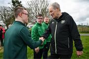 19 March 2024; Republic of Ireland technical advisor Brian Kerr meets Michael McCloy, from Armagh, of the Ireland Down Syndrome Futsal squad on a visit to a Republic of Ireland training session at the FAI National Training Centre in Abbotstown, Dublin. Photo by Stephen McCarthy/Sportsfile
