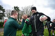 19 March 2024; Republic of Ireland interim head coach John O'Shea meets Michael McCloy, from Armagh, of the Ireland Down Syndrome Futsal squad on a visit to a Republic of Ireland training session at the FAI National Training Centre in Abbotstown, Dublin. Photo by Stephen McCarthy/Sportsfile
