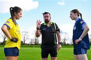 20 March 2024; Referee Seamus Mulvihill performs the coin toss with team captains Beth Hoban of Sacred Heart School and Hazel Hughes of Our Lady's Secondary School before the 2024 Lidl LGFA All-Ireland Post-Primary Schools Senior A final match between Our Lady’s Secondary School of Castleblaney, Monaghan, and Sacred Heart School of Westport, Mayo, at St Rynagh’s GAA club in Banagher, Offaly. Photo by Tyler Miller/Sportsfile