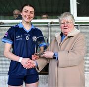 20 March 2024; Hazel Hughes of Our Lady's Secondary School receives the player of the match award from Geraldine Carey, representing the LGFA, after the 2024 Lidl LGFA All-Ireland Post-Primary Schools Senior A final match between Our Lady’s Secondary School of Castleblaney, Monaghan, and Sacred Heart School of Westport, Mayo, at St Rynagh’s GAA club in Banagher, Offaly. Photo by Tyler Miller/Sportsfile