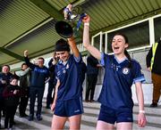 20 March 2024; Hazel Hughes, right, and Laura Grimes of Our Lady's Secondary School celebrate with the cup after the 2024 Lidl LGFA All-Ireland Post-Primary Schools Senior A final match between Our Lady’s Secondary School of Castleblaney, Monaghan, and Sacred Heart School of Westport, Mayo, at St Rynagh’s GAA club in Banagher, Offaly. Photo by Tyler Miller/Sportsfile