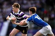 20 March 2024; Ewan McGinty of Terenure College is tackled by Donal Manzor of St Mary’s College during the Bank of Ireland Leinster Schools Junior Cup final match between St Mary's College and Terenure College at Energia Park in Dublin. Photo by Harry Murphy/Sportsfile