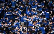 20 March 2024; St Mary’s College supporters celebrate their side's first try during the Bank of Ireland Leinster Schools Junior Cup final match between St Mary's College and Terenure College at Energia Park in Dublin. Photo by Harry Murphy/Sportsfile
