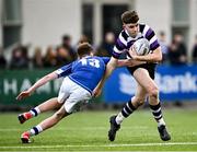 20 March 2024; Niall Fallon of Terenure College is tackled by Donal Manzor of St Mary’s College during the Bank of Ireland Leinster Schools Junior Cup final match between St Mary's College and Terenure College at Energia Park in Dublin. Photo by Harry Murphy/Sportsfile