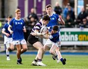 20 March 2024; Senan Gavin of Terenure College is tackled by Tom O’Keefe of St Mary’s College during the Bank of Ireland Leinster Schools Junior Cup final match between St Mary's College and Terenure College at Energia Park in Dublin. Photo by Daire Brennan/Sportsfile