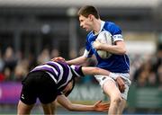 20 March 2024; Tom O’Keefe of St Mary’s College is tackled by Cillian McGetrick of Terenure College during the Bank of Ireland Leinster Schools Junior Cup final match between St Mary's College and Terenure College at Energia Park in Dublin. Photo by Daire Brennan/Sportsfile