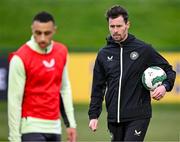 18 March 2024; Assistant coach Paddy McCarthy and Adam Idah, left, during a Republic of Ireland training session at the FAI National Training Centre in Abbotstown, Dublin. Photo by Stephen McCarthy/Sportsfile