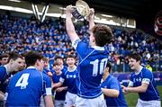 20 March 2024; Nic Sheehan of St Mary’s College lifts the trophy after his side's victory in the Bank of Ireland Leinster Schools Junior Cup final match between St Mary's College and Terenure College at Energia Park in Dublin. Photo by Harry Murphy/Sportsfile