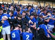 20 March 2024; St Mary’s College players and supporters celebrate after their side's victory in the Bank of Ireland Leinster Schools Junior Cup final match between St Mary's College and Terenure College at Energia Park in Dublin. Photo by Harry Murphy/Sportsfile