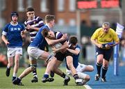 20 March 2024; Andrew Smyth of Terenure College is tackled by Eoin Farrell and Jack Fogarty of St Mary’s College during the Bank of Ireland Leinster Schools Junior Cup final match between St Mary's College and Terenure College at Energia Park in Dublin. Photo by Harry Murphy/Sportsfile