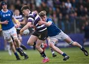 20 March 2024; Tommy Smyth of Terenure College is tackled by Eoin Farrell of St Mary’s College during the Bank of Ireland Leinster Schools Junior Cup final match between St Mary's College and Terenure College at Energia Park in Dublin. Photo by Harry Murphy/Sportsfile