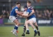 20 March 2024; Cian Dunphy of St Mary’s College is tackled by Niall Fallon of Terenure College during the Bank of Ireland Leinster Schools Junior Cup final match between St Mary's College and Terenure College at Energia Park in Dublin. Photo by Harry Murphy/Sportsfile