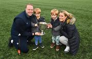 20 March 2024; St Mary's College coach Jamie Cornett, celebrates with his wife Eimear, and sons Timothy, and Luke, aged 3, after the Bank of Ireland Leinster Schools Junior Cup final match between St Mary's College and Terenure College at Energia Park in Dublin. Photo by Daire Brennan/Sportsfile