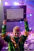 21 March 2024; Supporter Marcus Buckley, age 11, from Bweeng, Cork, before the BetMGM Premier League Darts at the 3Arena in Dublin. Photo by Ben McShane/Sportsfile