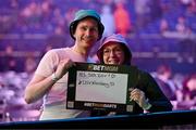 21 March 2024; Supporters Philipp Nielsen, left, and Kathrin Koehler, both from Nuremberg, Germany, take their position before the BetMGM Premier League Darts at the 3Arena in Dublin. Photo by Ben McShane/Sportsfile