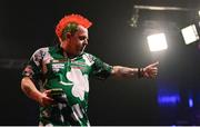 21 March 2024; Peter Wright leaves the stage after defeat in his match against Luke Humphries at the BetMGM Premier League Darts at the 3Arena in Dublin. Photo by Ben McShane/Sportsfile