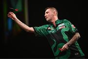 21 March 2024; Nathan Aspinall in action during his match against Rob Cross at the BetMGM Premier League Darts at the 3Arena in Dublin. Photo by Ben McShane/Sportsfile