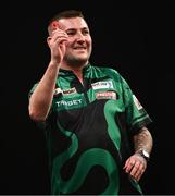21 March 2024; Nathan Aspinall reacts during his match against Rob Cross at the BetMGM Premier League Darts at the 3Arena in Dublin. Photo by Ben McShane/Sportsfile