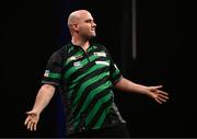 21 March 2024; Rob Cross celebrates after winning a leg during his match against Nathan Aspinall at the BetMGM Premier League Darts at the 3Arena in Dublin. Photo by Ben McShane/Sportsfile