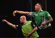 21 March 2024; (EDITORS NOTE: Image created using the multiple exposure function in camera) Gerwyn Price, right, and Michael van Gerwen in action during their match at the BetMGM Premier League Darts at the 3Arena in Dublin. Photo by Ben McShane/Sportsfile