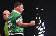 21 March 2024; Gerwyn Price celebrates after victory over Michael van Gerwen in their match at the BetMGM Premier League Darts at the 3Arena in Dublin. Photo by Ben McShane/Sportsfile