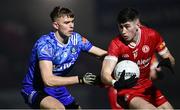 16 March 2024; Ciarán Daly of Tyrone in action against Joel Wilson of Monaghan during the Allianz Football League Division 1 match between Tyrone and Monaghan at O'Neills Healy Park in Omagh, Tyrone.  Photo by Ramsey Cardy/Sportsfile