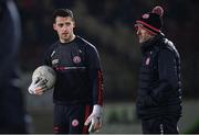 16 March 2024; Tyrone joint-manager Brian Dooher, right, and Tyrone goalkeeper Niall Morgan before the Allianz Football League Division 1 match between Tyrone and Monaghan at O'Neills Healy Park in Omagh, Tyrone.  Photo by Ramsey Cardy/Sportsfile