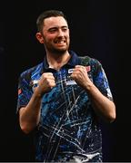 21 March 2024; Luke Humphries celebrates after victory in his semi-final match against Nathan Aspinall at the BetMGM Premier League Darts at the 3Arena in Dublin. Photo by Ben McShane/Sportsfile