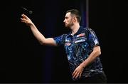 21 March 2024; Luke Humphries in action during his final match against Michael Smith at the BetMGM Premier League Darts at the 3Arena in Dublin. Photo by Ben McShane/Sportsfile
