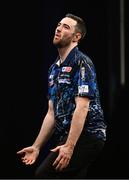 21 March 2024; Luke Humphries reacts during his final match against Michael Smith at the BetMGM Premier League Darts at the 3Arena in Dublin. Photo by Ben McShane/Sportsfile