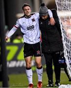 15 March 2024; Jamie Gullan of Dundalk leaves the pitch with an injury during the SSE Airtricity Men's Premier Division match between Dundalk and Waterford at Oriel Park in Dundalk, Louth. Photo by Ramsey Cardy/Sportsfile