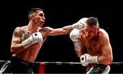 17 March 2024; Reuquen Cona Facundo Arce, left, in action against Ray Moylette during their super light weight bout at TF Royal Theatre in Castlebar, Mayo. Photo by Piaras Ó Mídheach/Sportsfile