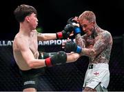 22 March 2024; Jordan Elliott, right, in action against Nate Kelly in their catchweight bout during the Bellator Champions Series at the SSE Arena in Belfast. Photo by David Fitzgerald/Sportsfile