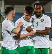 22 March 2024; Andrew Moran of Republic of Ireland, centre, celebrates with team-mates Joe Hodge, left, and Tayo Adaramola after scoring his side's second goal during the UEFA European Under-21 Championship qualifier match between San Marino and Republic of Ireland at San Marino Stadium in Serravalle, San Marino. Photo by Roberto Bregani/Sportsfile