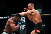 22 March 2024; Luke Trainer, right, in action against Grant Neal in their light heavyweight bout during the Bellator Champions Series at the SSE Arena in Belfast. Photo by David Fitzgerald/Sportsfile