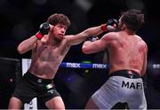 22 March 2024; Ciaran Clarke, left, in action against Darius Mafi in their bantamweight bout during the Bellator Champions Series at the SSE Arena in Belfast. Photo by David Fitzgerald/Sportsfile