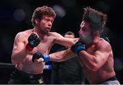 22 March 2024; Ciaran Clarke, left, in action against Darius Mafi in their bantamweight bout during the Bellator Champions Series at the SSE Arena in Belfast. Photo by David Fitzgerald/Sportsfile