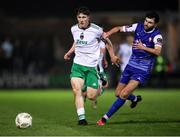 22 March 2024; Josh Fitzpatrick of Cork City in action against Oisin O'Reilly of Treaty United during the SSE Airtricity Men's First Division match between Treaty United and Cork City at Markets Field in Limerick. Photo by Michael P Ryan/Sportsfile