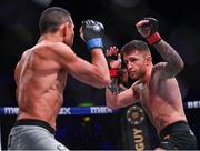22 March 2024; James Gallagher, right, in action against Leandro Higo in their featherweight bout during the Bellator Champions Series at the SSE Arena in Belfast. Photo by David Fitzgerald/Sportsfile