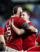 22 March 2024; RG Snyman of Munster, left, celebrates with team-mate Mike Haley after scoring his side's fourth try during the United Rugby Championship match between Ospreys and Munster at the Swansea.com Stadium in Swansea, Wales. Photo by Chris Fairweather/Sportsfile