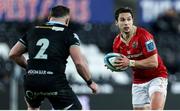 22 March 2024; Joey Carbery of Munster in action against Sam Parry of Ospreys during the United Rugby Championship match between Ospreys and Munster at the Swansea.com Stadium in Swansea, Wales. Photo by Chris Fairweather/Sportsfile