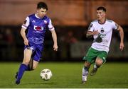22 March 2024; Thomas Considine of Treaty United in action against Evan McLaughlin of Cork City during the SSE Airtricity Men's First Division match between Treaty United and Cork City at Markets Field in Limerick. Photo by Michael P Ryan/Sportsfile