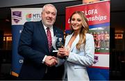 22 March 2024; Kira Bryan of DCU Dóchas Éireann receives her Rising Star award from Ladies HEC chairperson Daniel Caldwell during the 2024 HEC All Stars awards night at the Dublin Bonnington Hotel in Dublin. Photo by Ramsey Cardy/Sportsfile
