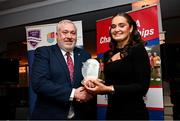 22 March 2024; Sophie Hennessy of Mary Immaculate College Limerick receives her Rising Star award from Ladies HEC chairperson Daniel Caldwell during the 2024 HEC All Stars awards night at the Dublin Bonnington Hotel in Dublin. Photo by Ramsey Cardy/Sportsfile